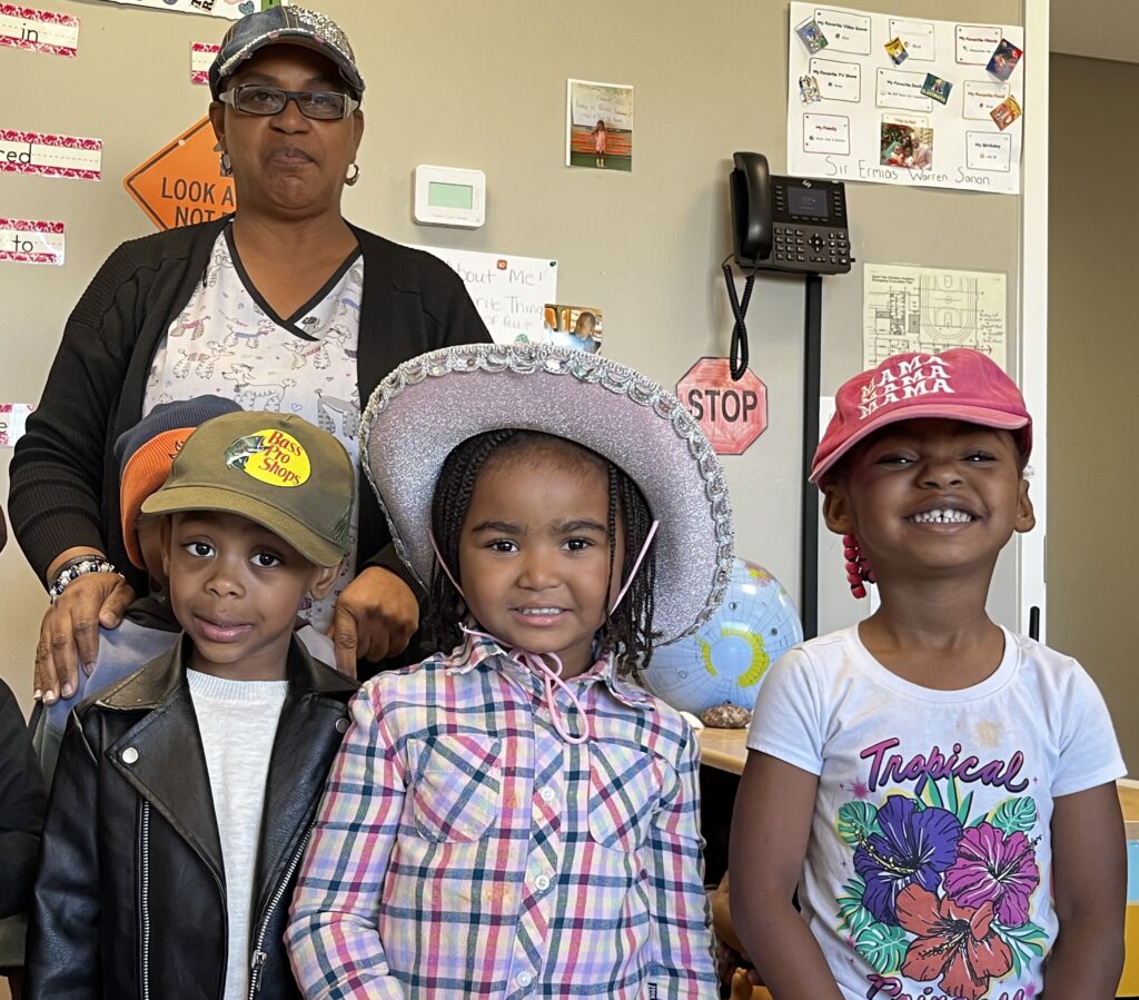Toddlers with teacher hat day